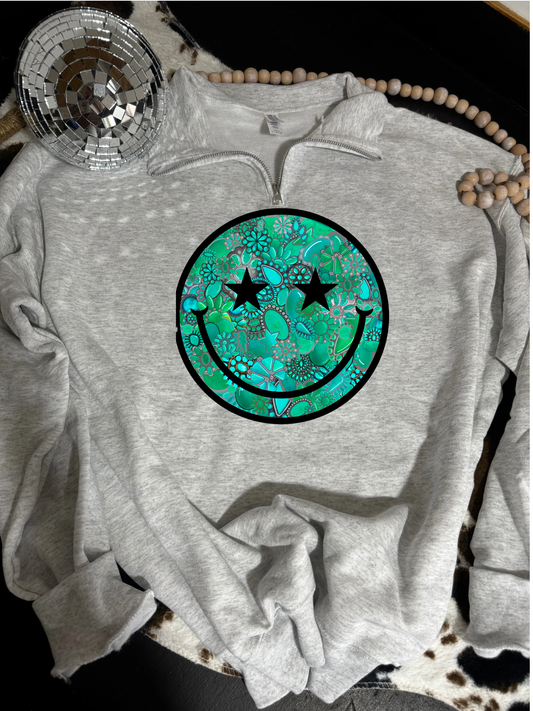 Turquoise smiley quarter zip